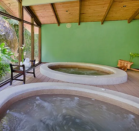 The spa jacuzzis, surrounded by forest